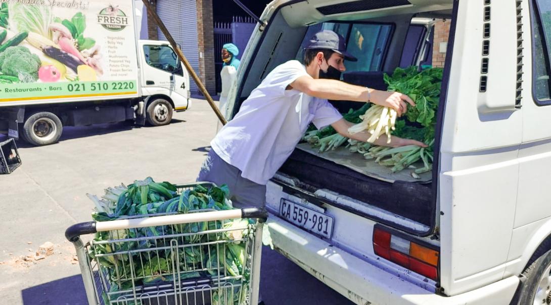 Projects Abroad Volunteer prepares ingredients for Feeding Outreach program in South Africa Projects Abroad Volunteer prepares ingredients for Feeding Outreach program in South Africa